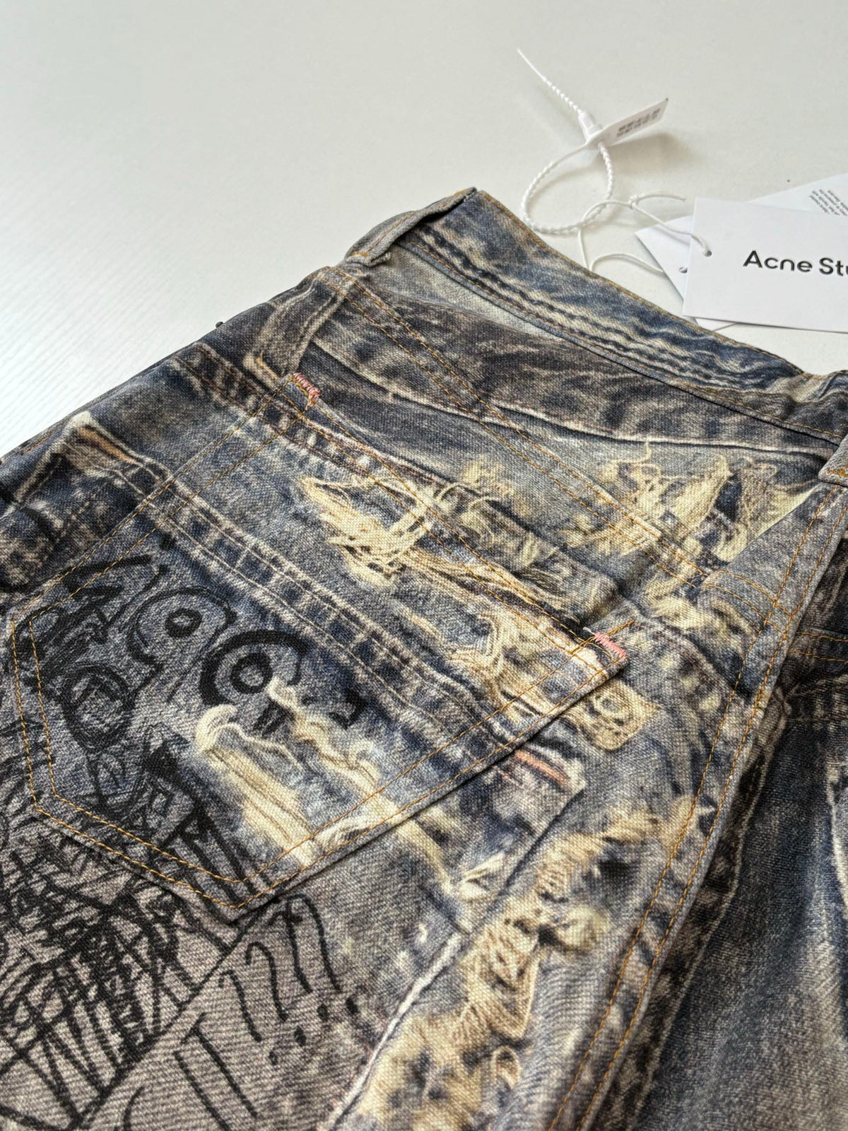 Acne Studios Graffiti‑Print Distressed Wide‑Leg Jeans