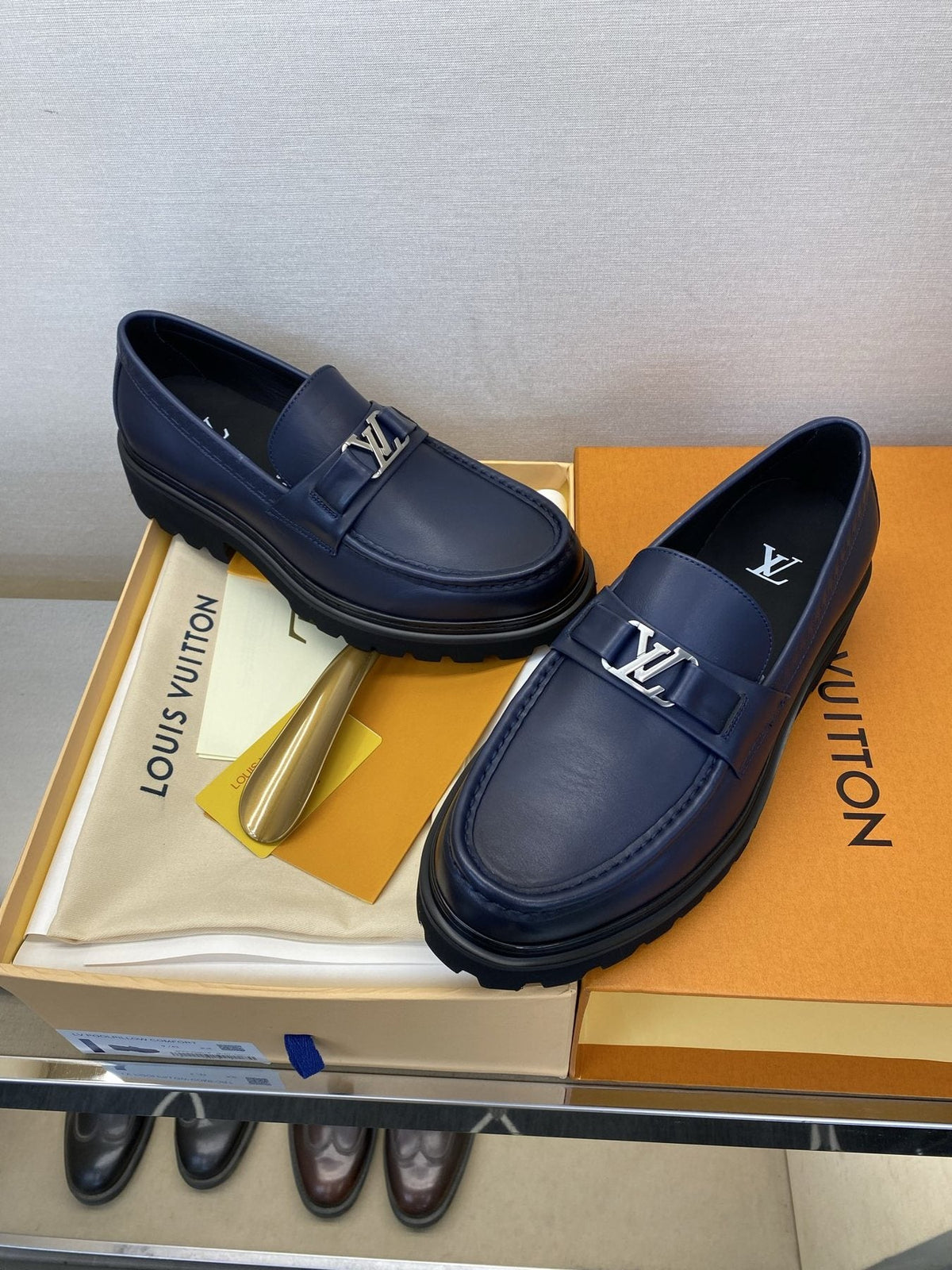 Louis Vuitton Men's Metal Logo Loafers